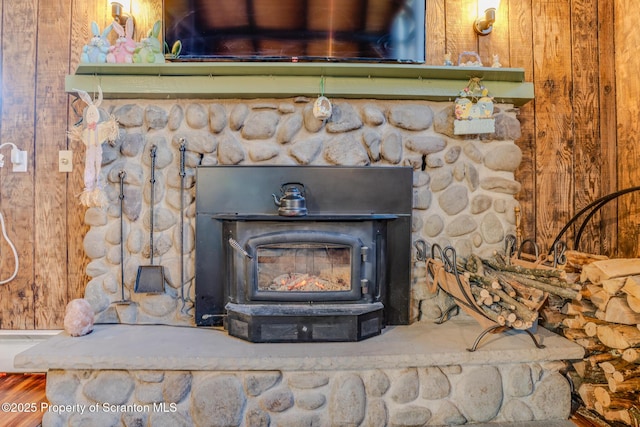 125 Frances Ln, Greentown, PA 18426 - interior details with wood finished floors, wood walls, and a wood stove