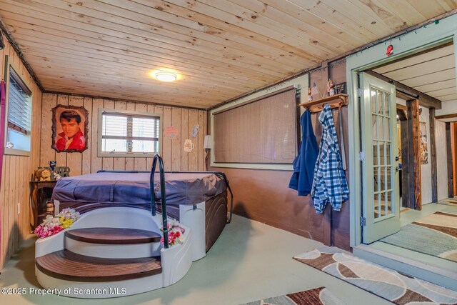 125 Frances Ln, Greentown, PA 18426 - interior space featuring wooden walls, wooden ceiling, and finished concrete floors