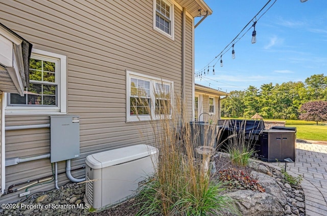 view of home's exterior featuring a patio area