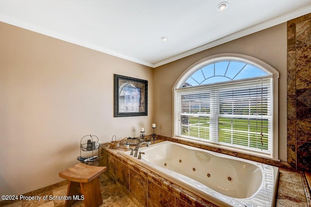 bathroom featuring tiled bath and crown molding