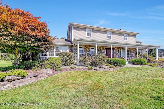 view of front of home with a front lawn