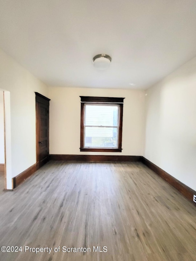 empty room with light wood-type flooring