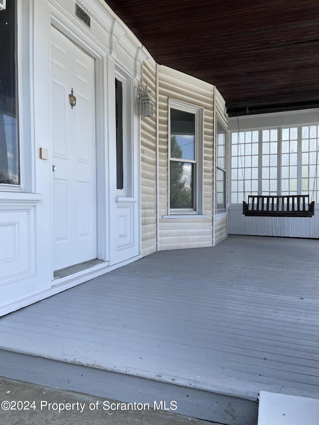 property entrance with a porch