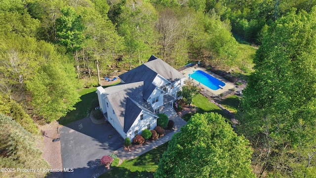 157 Mcesther Dr Unit L 31, Covington Twp, PA 18424 - aerial view of property and surrounding area with a pool area and a forest