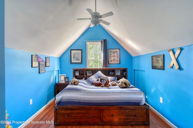 157 Mcesther Dr Unit L 31, Covington Twp, PA 18424 - bedroom featuring wood finished floors, lofted ceiling, and a ceiling fan