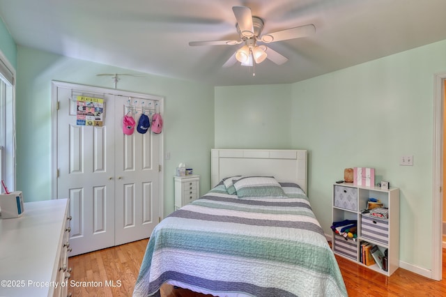 157 Mcesther Dr Unit L 31, Covington Twp, PA 18424 - bedroom featuring light wood-style floors, a closet, and ceiling fan
