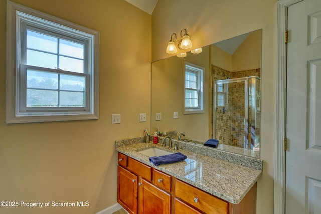 157 Mcesther Dr Unit L 31, Covington Twp, PA 18424 - full bathroom with plenty of natural light, vanity, a stall shower, and lofted ceiling