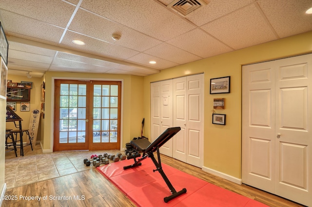 157 Mcesther Dr Unit L 31, Covington Twp, PA 18424 - workout room with wood finished floors, recessed lighting, and a paneled ceiling