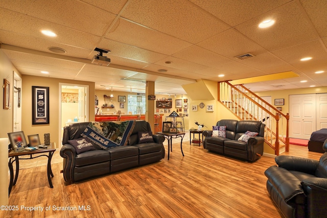 157 Mcesther Dr Unit L 31, Covington Twp, PA 18424 - living area with stairs, wood finished floors, and recessed lighting