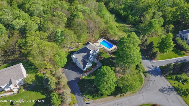 157 Mcesther Dr Unit L 31, Covington Twp, PA 18424 - drone / aerial view of a forest and a pool