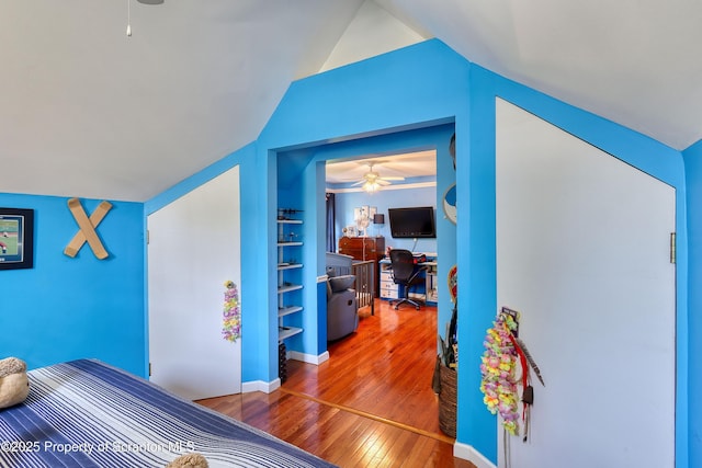 157 Mcesther Dr Unit L 31, Covington Twp, PA 18424 - bedroom featuring hardwood / wood-style floors, lofted ceiling, and a desk