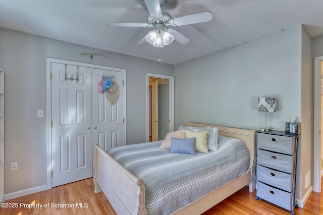157 Mcesther Dr Unit L 31, Covington Twp, PA 18424 - bedroom featuring a closet, light wood-style floors, and ceiling fan
