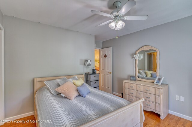 157 Mcesther Dr Unit L 31, Covington Twp, PA 18424 - bedroom featuring light wood-style floors and ceiling fan