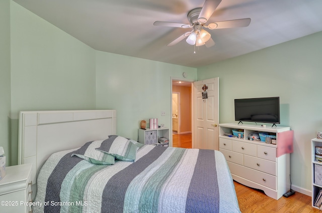 157 Mcesther Dr Unit L 31, Covington Twp, PA 18424 - bedroom featuring wood finished floors and a ceiling fan