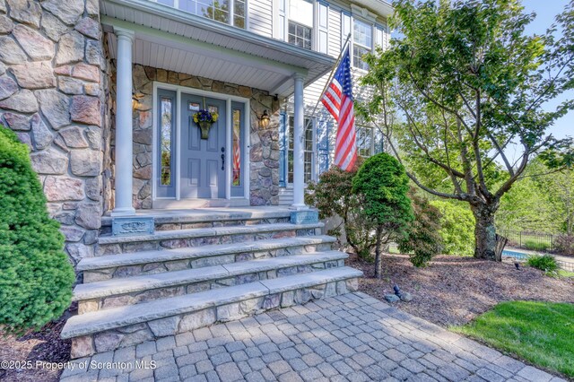 157 Mcesther Dr Unit L 31, Covington Twp, PA 18424 - property entrance with stone siding