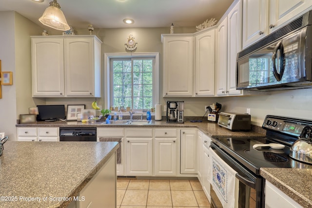 157 Mcesther Dr Unit L 31, Covington Twp, PA 18424 - kitchen with black appliances, white cabinetry, light tile patterned floors, hanging light fixtures, and recessed lighting