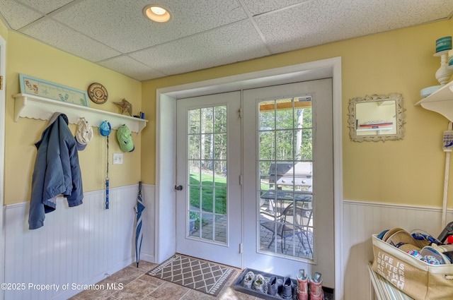 157 Mcesther Dr Unit L 31, Covington Twp, PA 18424 - entryway featuring a wainscoted wall and a drop ceiling