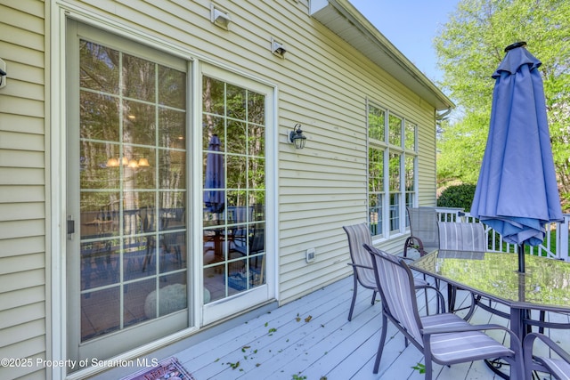 157 Mcesther Dr Unit L 31, Covington Twp, PA 18424 - wooden terrace with outdoor dining area