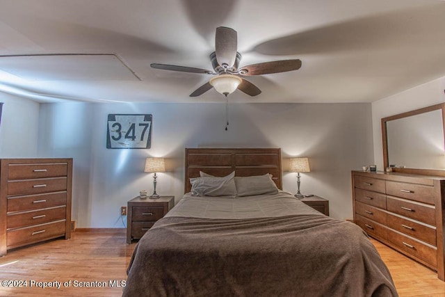 bedroom featuring ceiling fan and light hardwood / wood-style floors