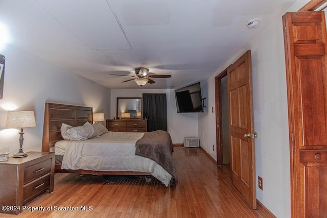 bedroom with ceiling fan and light wood-type flooring