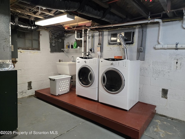 washroom with washing machine and dryer