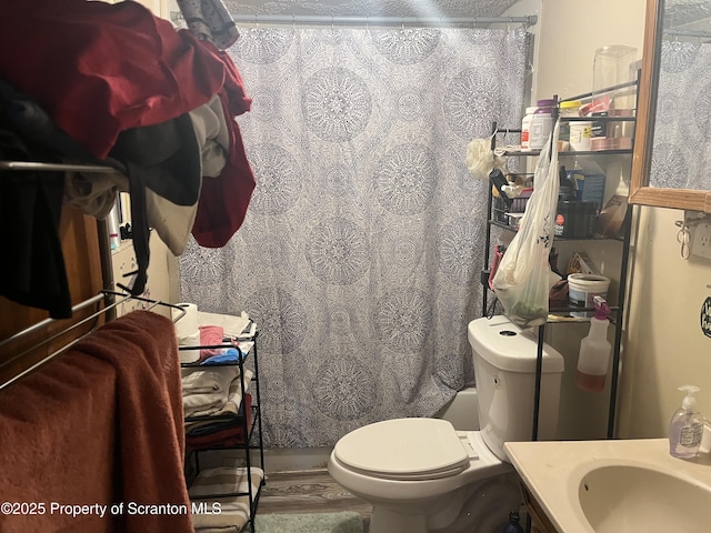 1034 Plane St, Avoca, PA 18641 - bathroom featuring a shower with curtain, vanity, and toilet