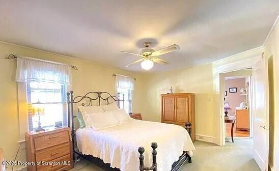 1747 Monsey Ave, Scranton, PA 18509 - bedroom featuring light colored carpet, a ceiling fan, and baseboards
