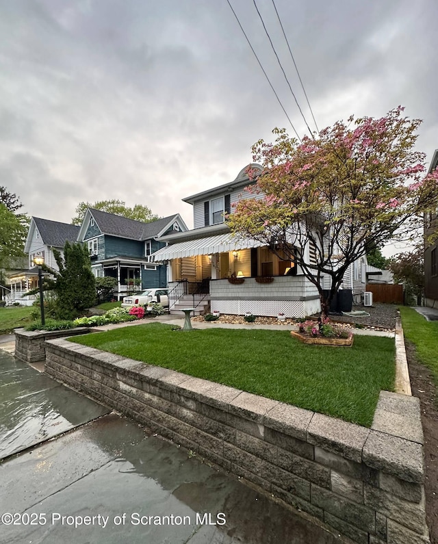 1747 Monsey Ave, Scranton, PA 18509 - view of front facade with a front yard