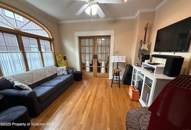 1747 Monsey Ave, Scranton, PA 18509 - living room with light wood finished floors, a ceiling fan, and crown molding