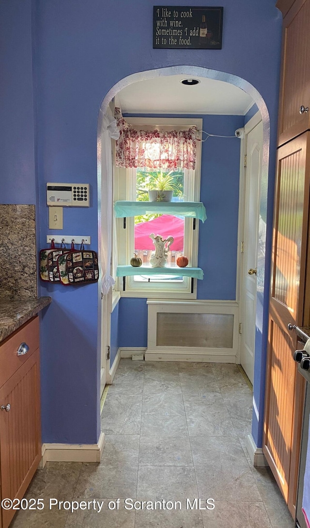 1747 Monsey Ave, Scranton, PA 18509 - doorway to outside featuring arched walkways and baseboards