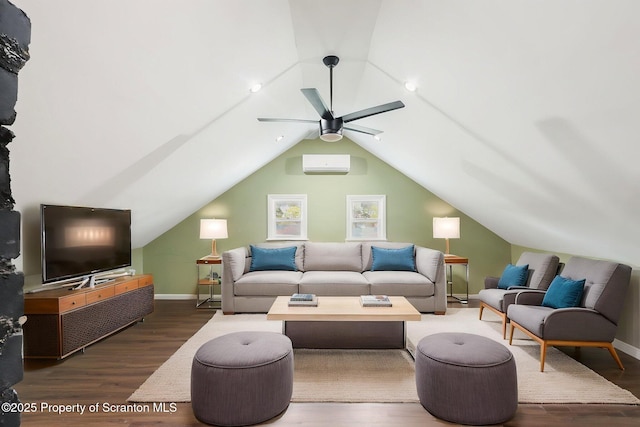 living area featuring baseboards, a wall mounted air conditioner, lofted ceiling, wood finished floors, and ceiling fan