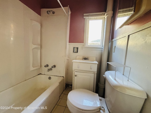 full bathroom with tile patterned floors, toilet, vanity, and washtub / shower combination