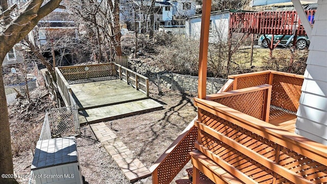 view of patio featuring fence