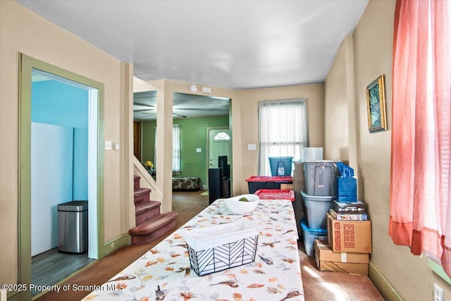 dining area featuring stairway