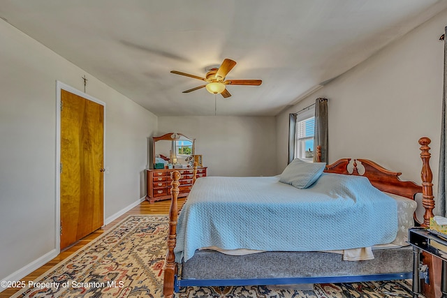 201 Franklin St, Dunmore, PA 18512 - bedroom with light wood-style flooring and a ceiling fan