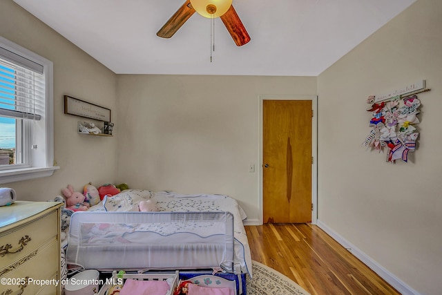 201 Franklin St, Dunmore, PA 18512 - bedroom with light wood-style floors and ceiling fan