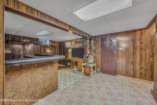201 Franklin St, Dunmore, PA 18512 - bar area with a drop ceiling, wood walls, and brick patterned flooring