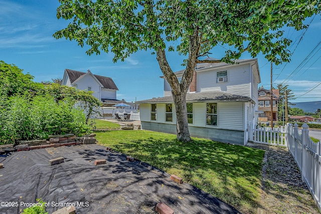 201 Franklin St, Dunmore, PA 18512 - rear view of property featuring a fenced backyard and a patio