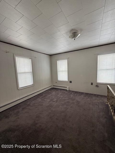 554 Back St, Scranton, PA 18504 - spare room with dark carpet