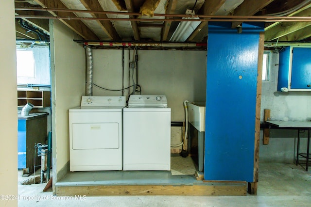 laundry room with washing machine and dryer