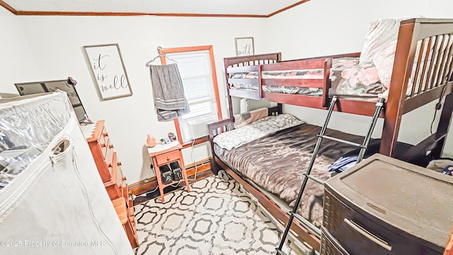 bedroom with cooling unit and ornamental molding