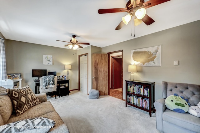 living room with light carpet and ceiling fan