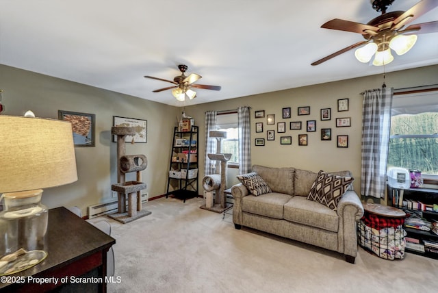 living room with a baseboard radiator, light carpet, and ceiling fan