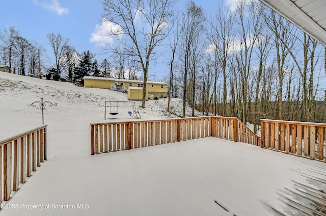 view of snow covered deck