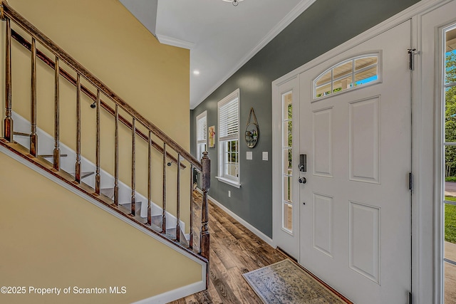 1612 Whitetail Run, Moscow, PA 18444 - foyer featuring ornamental molding, wood finished floors, stairway, and recessed lighting