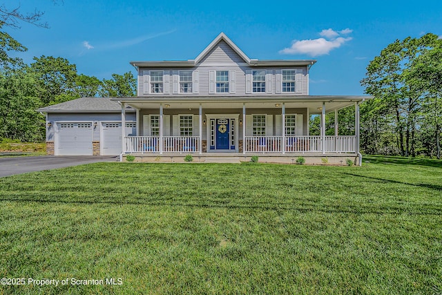 1612 Whitetail Run, Moscow, PA 18444 - view of front facade featuring a porch, asphalt driveway, a front lawn, and a garage