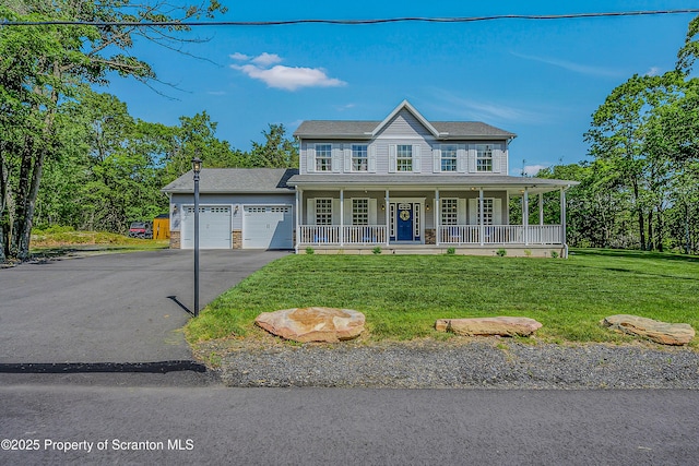 1612 Whitetail Run, Moscow, PA 18444 - colonial inspired home with a porch, asphalt driveway, a garage, and a front yard