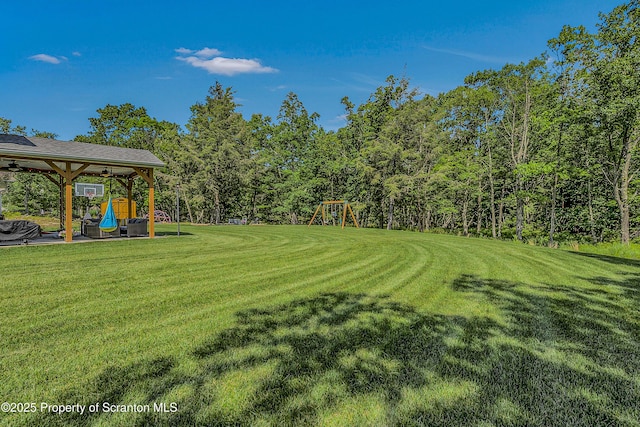 1612 Whitetail Run, Moscow, PA 18444 - view of grassy yard featuring a playground