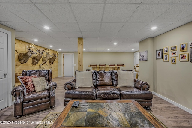 1612 Whitetail Run, Moscow, PA 18444 - living area with wood finished floors, recessed lighting, and a paneled ceiling