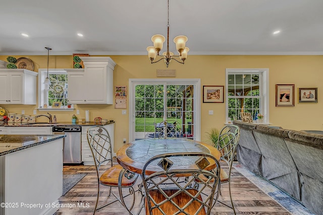 1612 Whitetail Run, Moscow, PA 18444 - dining space with a chandelier, light wood finished floors, ornamental molding, and recessed lighting